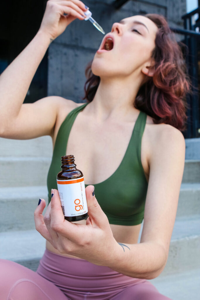 Try CBD Energy Drinks Instead 4 example of someone taking sublingual cbd drops